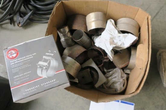 Box Of Muffler Clamps And Accessories