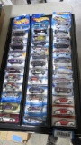 (36) Hot Wheels On Display Rack