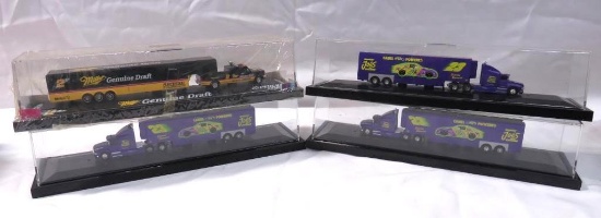 (4) Race Car Transporters in Display Case