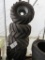 (6) Goodyear Rawhide 21X11.00/8 NHS Tires on a 8x8 5 Lug Rim, & set of Tracks
