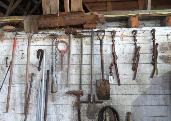 Asst. Stick Tools & Chain Binders on Wall