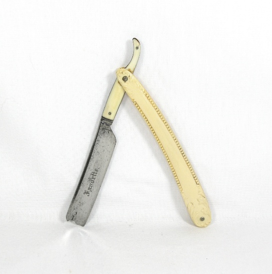 C.F. Wolfertz,  Allentown, PA  (faint) Hollowpoint blade straight razor wit