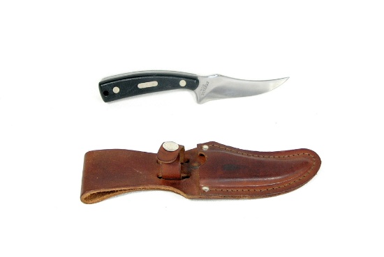 Schrade U.S.A. "Sharpfinger" hunting knife marked "Guns & Ammo" on handle.