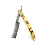 The Lawton Cutlery Co. Chicago IL straight razor. Has Variegated cream rust