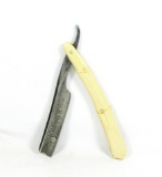 John Pritzlaff Hardware Co. Milwaukee WI straight razor.  Has embosseed ivo