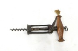 A Unique Vintage Cork Screw with Wood Handle that has a Side Brush. A Side