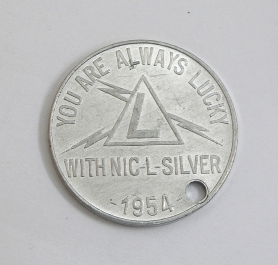 1954 Aluminum NIC-L-SILVER Coin/Token. "Good For 1 Dollar On A New Battery"