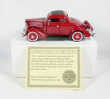 Diecast Replica of 1936 Ford Deluxe 5-Window Coupe From National Motor Muse