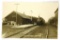 24.  RPPC:  c1912 Chicago & North Western Railway Depot with Engine 982 rol