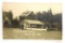126. c1930 RPPC Bide-A-Wee Cottage Minocqua, Wis. with huge motor launch at