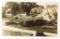 127.  c1928 RPPC Darlington Wisconsin Through the Bridge; Lots of Period Au