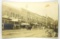 537.  c1915 RPPC Petoskey, Mich. Mitchell Street with period Automobiles an