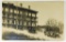 552.  1920’s RPPC Winter Sports A Beulah Home Boyne City, Mich. With 19 kid