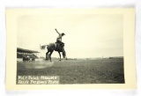 47.  RPPC:  1930’s / 1940’s Wolf Point (Montana) Stampede Window Pane Shirt