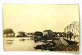 528.  c1910 RPPC Kingston, Wis. Dam and Steel Bridge in right foreground; p