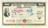 604.  United States 1945 $50 United Sates Savings Bond issued to  Owen A. o