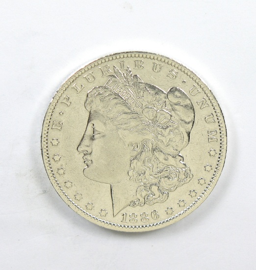 248.    1886-O Morgan Silver Dollar