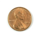 1969-D Lincoln Cent JFK Profile stamped before Lincoln's Face.  SIZE:  Stan