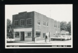 ADAMS: 1955 RPPC of POST OFFICE  ADAMS, WIS. with 1950s Automobiles.  SIZE: