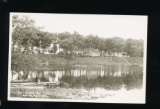 AMHERST:  RPPC of Cottages at LAKE EMILY AMHERST, WIS. with Boats, Cottages