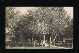 AMHERST:  1908 RPPC of the Lovely and amply Shaded home of P. N. Peterson a