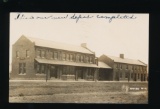 ANTIGO: 1907 RPPC of The recently completed Antigo Double Depot Brick Build