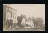 AUGUSTA:  1907 RPPC on Stone St. Augusta.  Three Gals pushing Buggies with