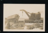 AUGUSTA:  (1908) RPPC Steam Loader Picking up (Train) Wreck.  SIZE:  Standa