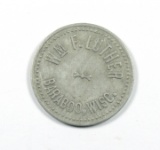 BARABOO:  WM. F. LUTHER / BARABOO, WISC. GOOD FOR /10c / IN TRADE.  SIZE: