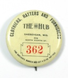 1910 Celluloid Advertising Pin for:  THE HUB / CLOTHIERS, HATTERS, AND FURN