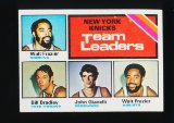 1975 Basketball Card #128 New York Knicks Team Leaders: Walt Frazier-Bill B