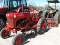 FARMALL CUB WITH CULTIVATORS, DISC, AND TURNING PLOW