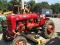 A FARMALL WITH MOWER