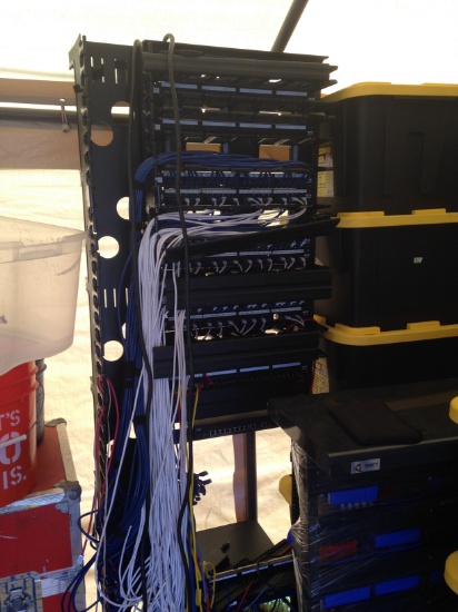 IP network tower with switches, cabling, organization frames and cable ladder