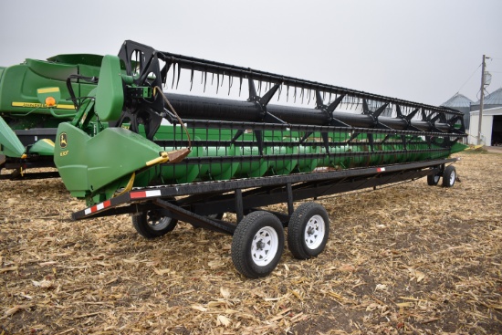 2013 John Deere 630F platform, poly skids,