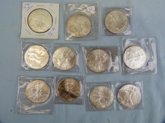 (11) 2001 US Silver Eagles, some toned, 11x$