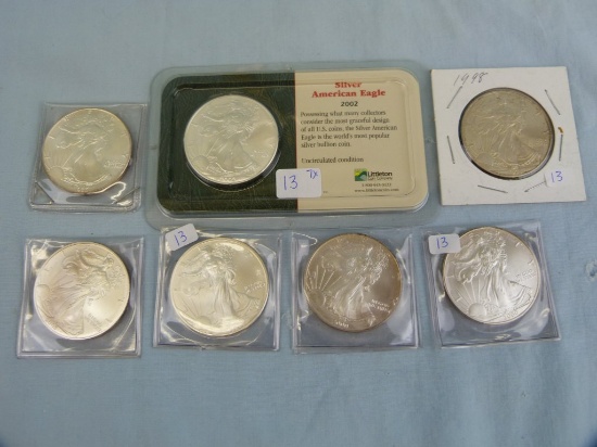 7 US Silver Eagles: 1986, 1998, (2) 2000, 2002, & (2) 2003, 7x$