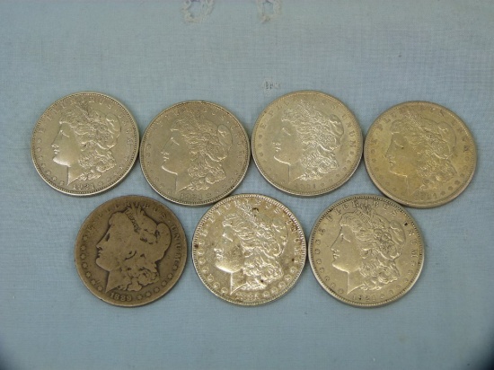 7 Morgan Dollars: 1885, 1889, & (5) 1921, 7x$