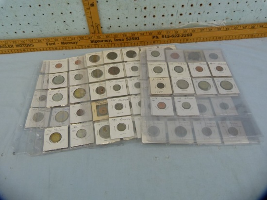 121 Southern Africa coins in notebook