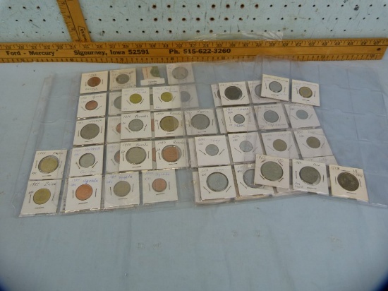 65 Central Africa coins in notebook