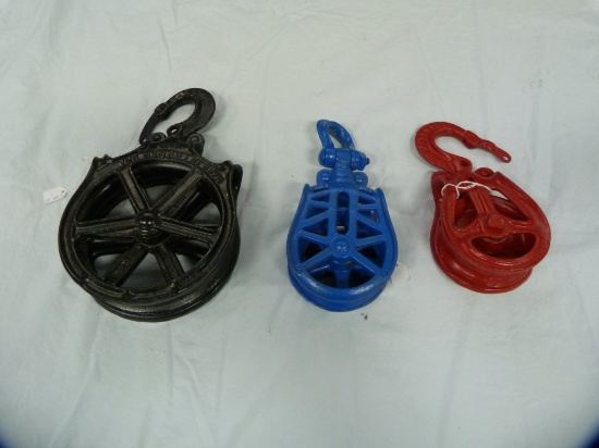 3 Metal pulleys, various sizes, painted