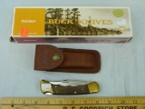 Buck USA 110 folding hunter knife, wood handles
