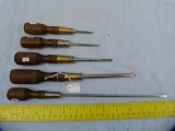 5 screwdrivers, 4 marked Winchester, wooden handles