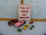 7 Items:  toy vehicles & metal sign