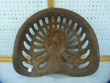 Cast iron tractor seat stamped D89, rusty