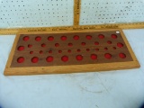 Wooden marble display with 35 slots for various sizes