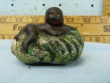 Black Memorabilia cast iron bank, baby on cabbage heads