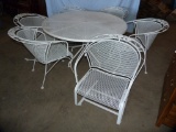 Newer metal patio table with 6 barrel chairs - 3 spring loaded/3 stationery
