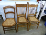 3 Cane-bottom chairs, 2 different designs, 3x$
