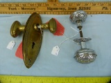 2 Pair doorknobs: oval brass w/back plate & silver color w/one rosette